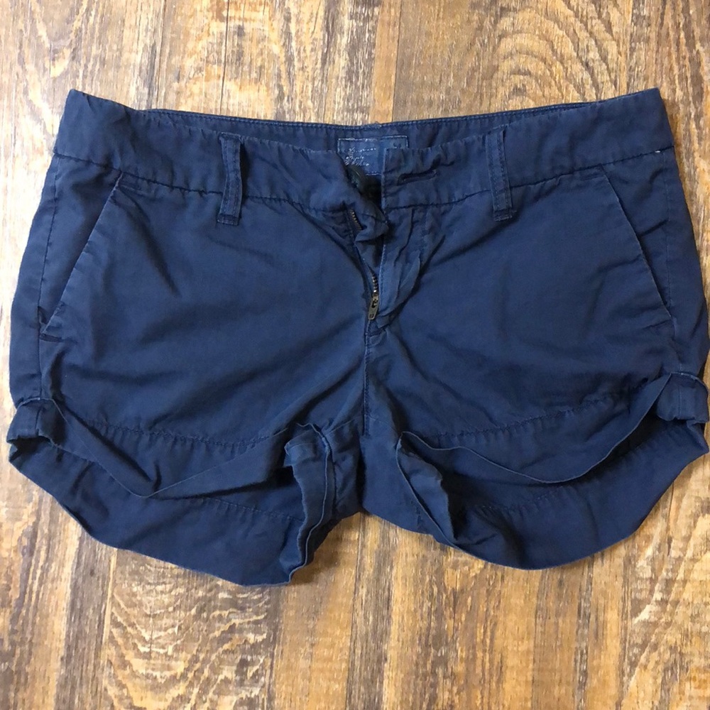 American Eagle blue shorts.
